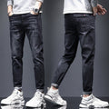 Mens Ripped Denim Jeans With Cat-Whisker Scratches